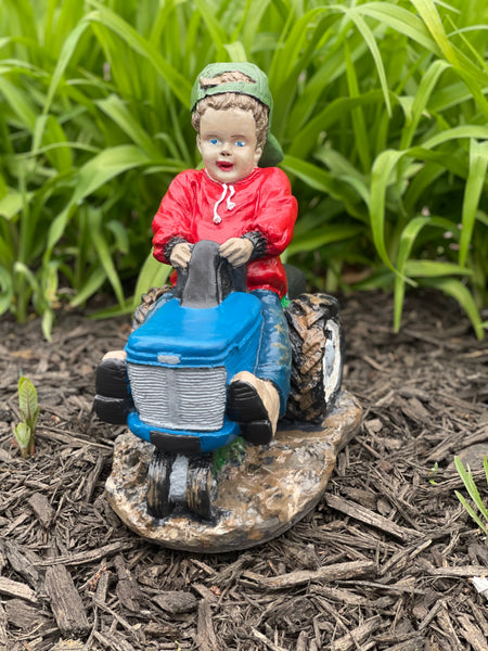 Boy Riding on a Tractor